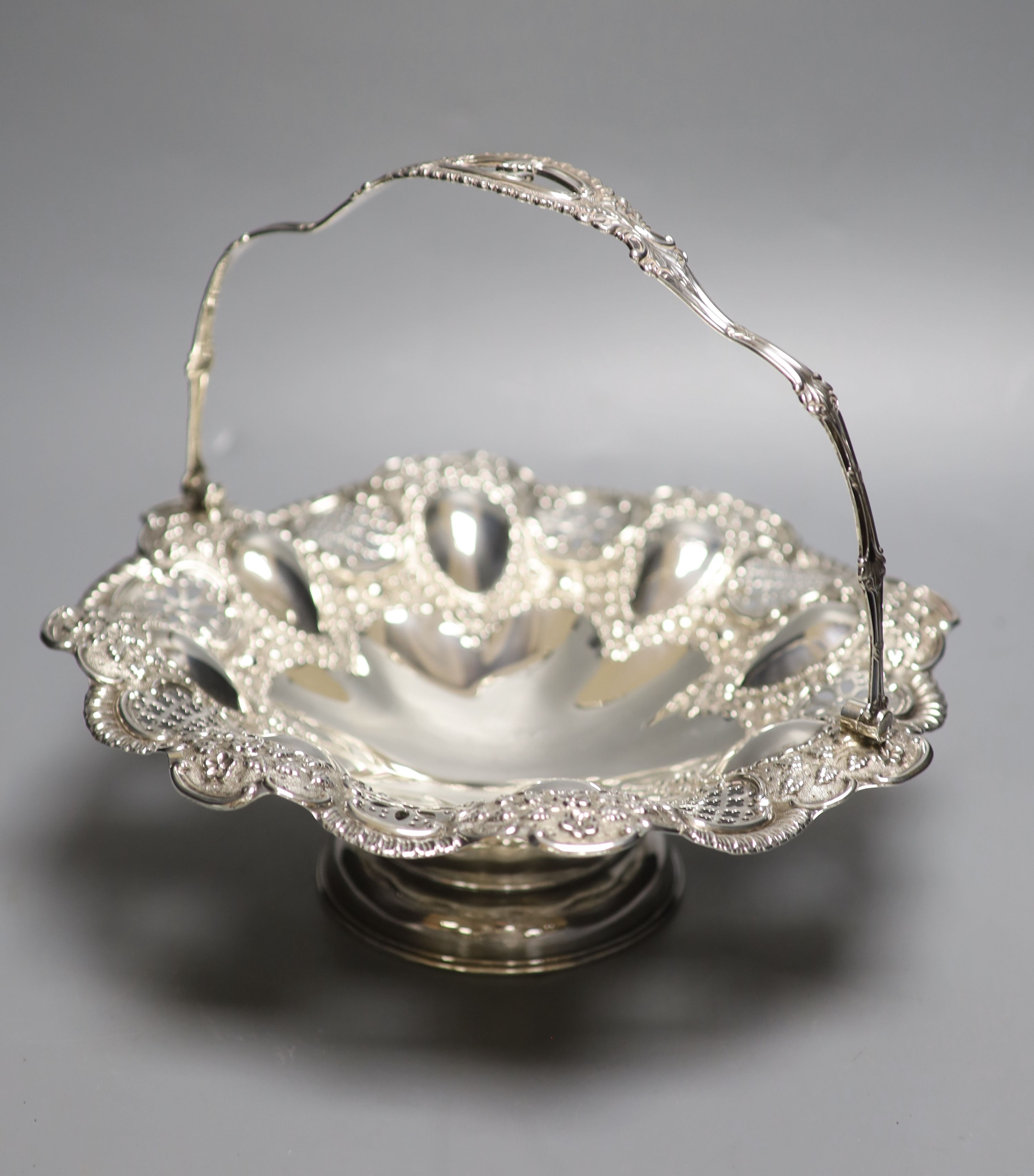An Edwardian embossed silver fruit basket, Joseph Rodgers & Sons, Sheffield, 1903, 28cm,